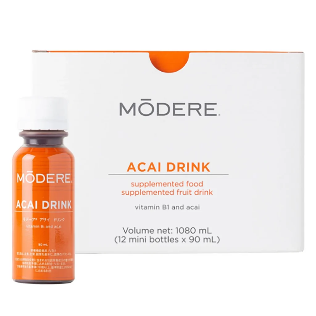 Orange bottle labeled 'MŌDERE Acai Drink' beside a white box reading 'ACAI DRINK' and 'volume net: 1080 mL (12 mini bottles x 90 mL)'