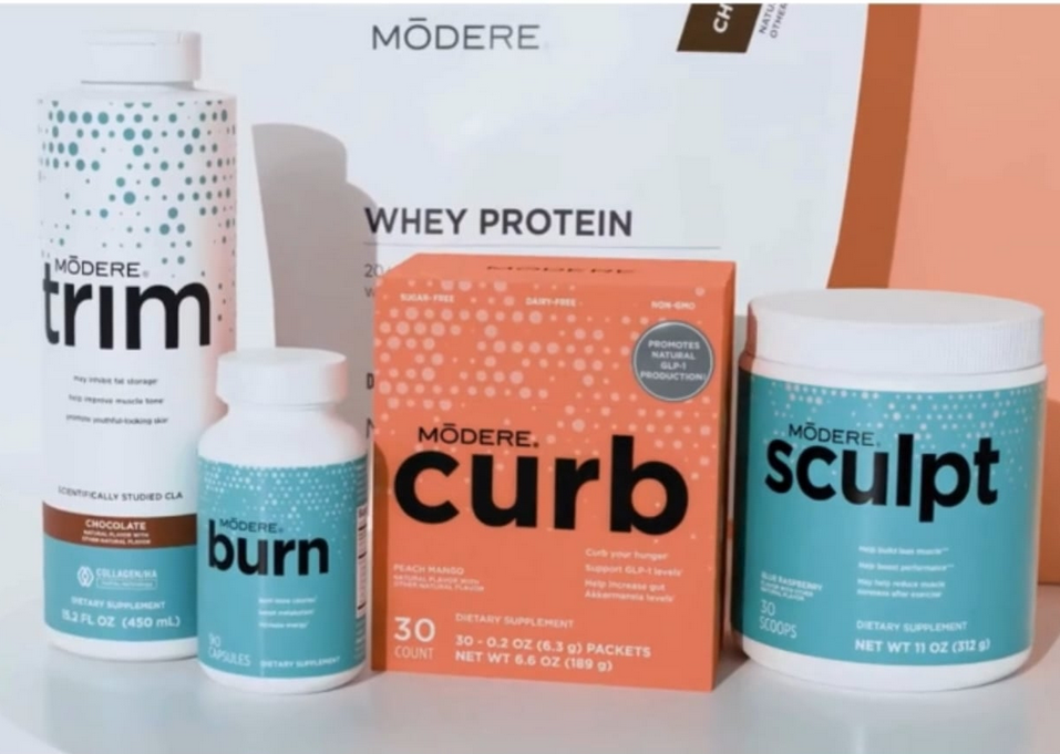 MÖDERE dietary supplements and whey protein: trim bottle, burn capsules, curb packets, sculpt tub displayed on a white surface.