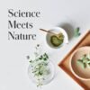 Shaklee Science Meets Nature - Shop Shaklee Australia Science Meets Nature: flat lay with herbs, green powder, and capsules on a marble background, conveying a nature-meets-science concept.