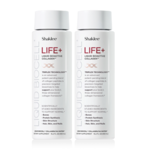 Two white Shaklee LIFE+ Liquid Bioactive Collagen dietary supplement bottles standing side by side.